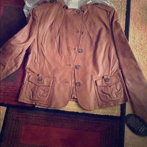 Brown light weight leather jacket.  Never worn